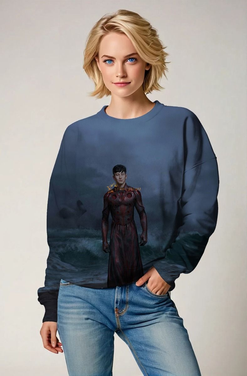 The Druig Sweatshirt in deep ocean blue showcases the powerful Eternal hero standing tall amidst the storm